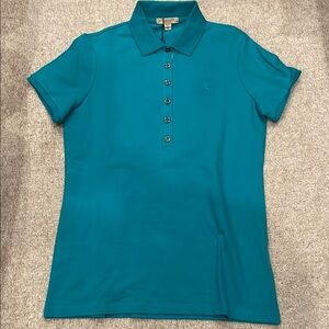 Women’s size medium Burberry short sleeve polo shirt.  New with tags.